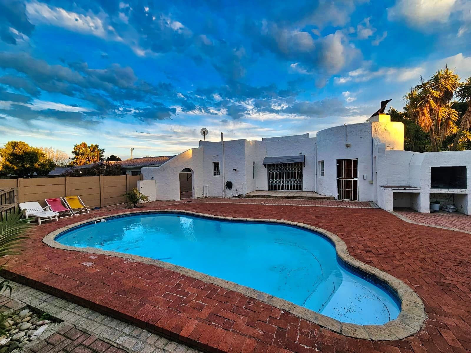 Swimming pool and paved patio